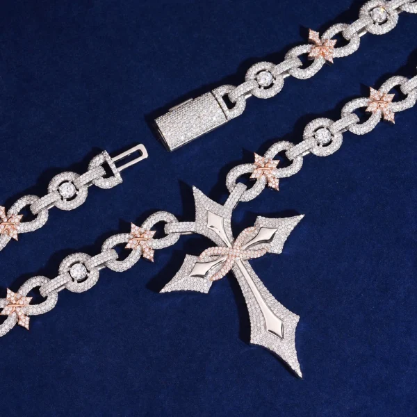 Close-up of a silver moissanite star cross pendant necklace on a dark teal background, pavé-set cross with rose gold star accents